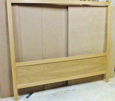 Diseño cabecero en madera y tapicería